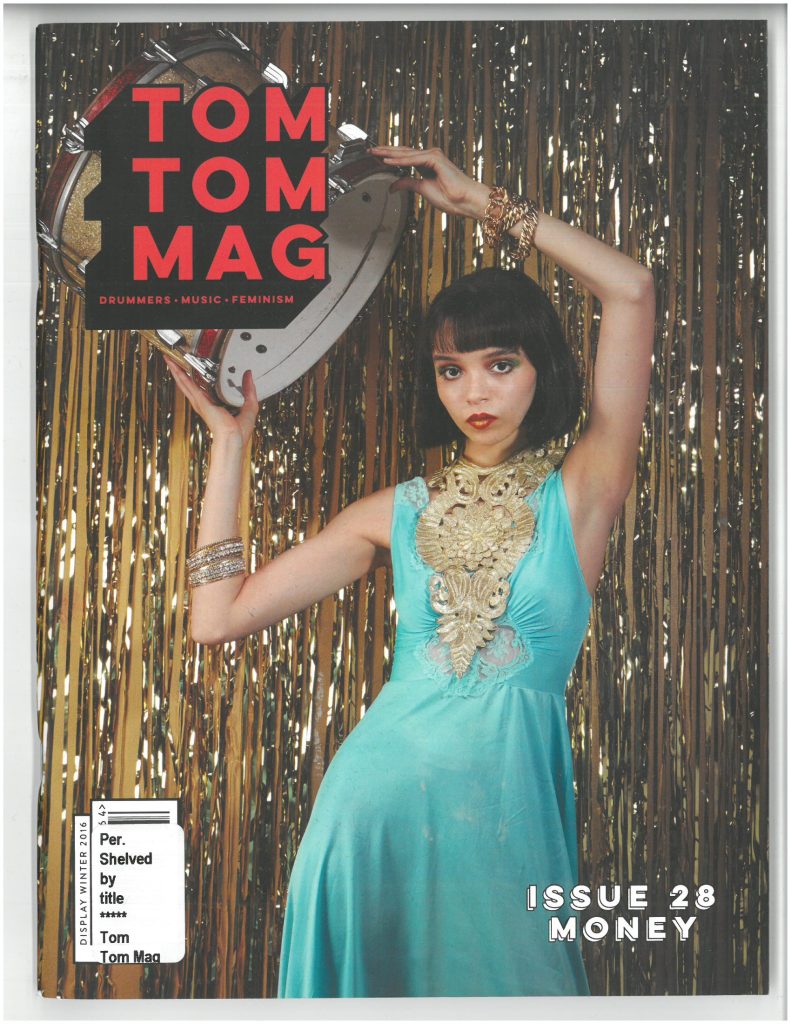 Tom Tom Magazine Issue 28: Money
Cover image of Rachel Trachtenburg holding a drum over her head